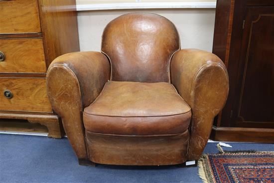 A 1940s French leather club armchair